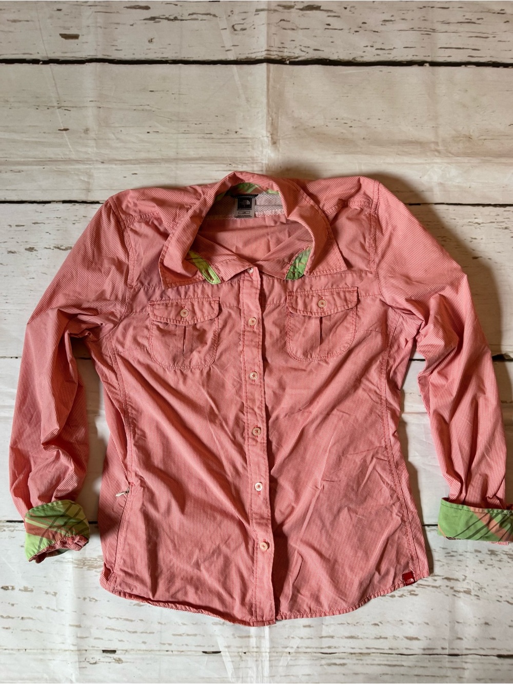 The North Face Women's Pink Button-Up Jacket with Green Trim. Fits more like med
